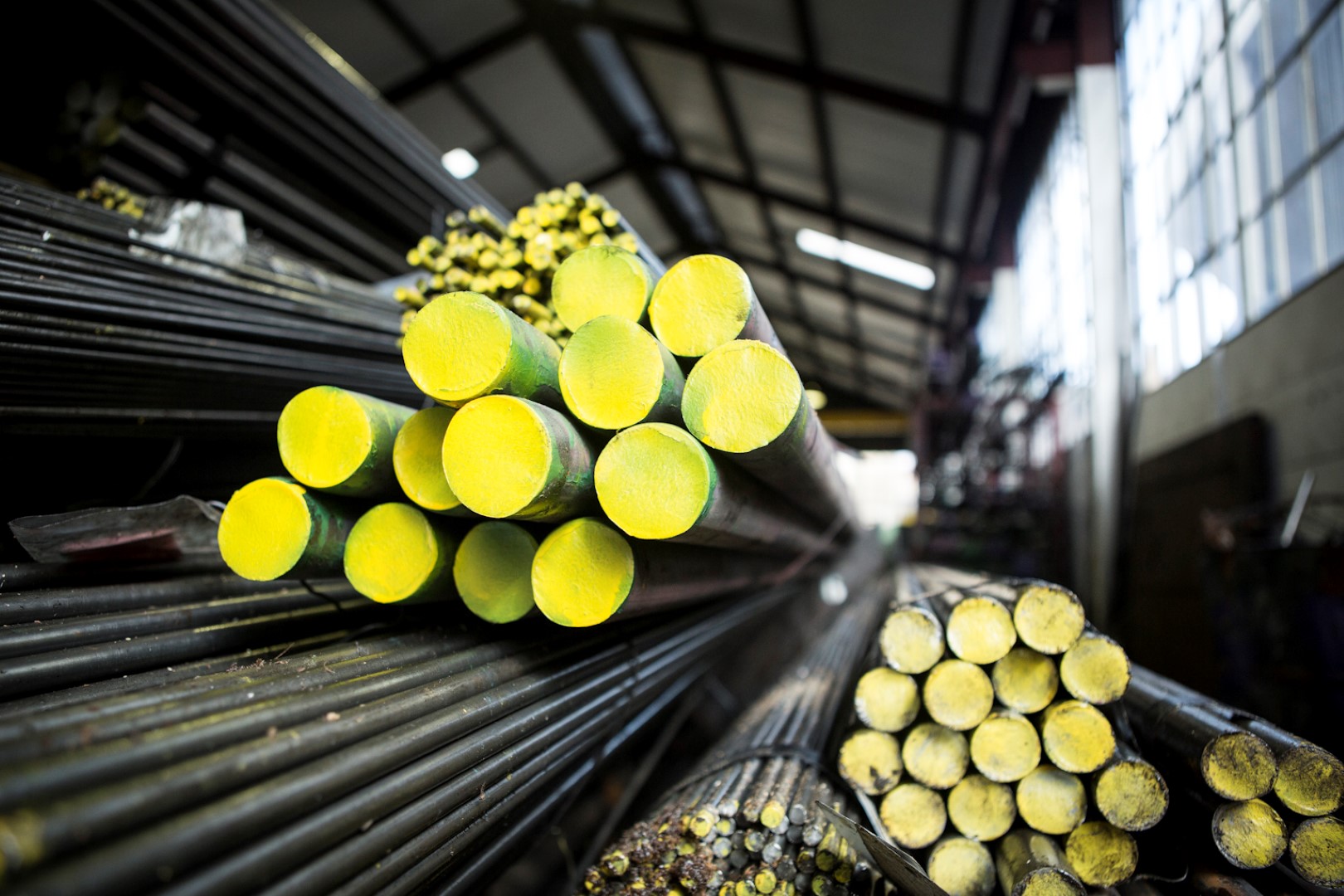 EN8 High tensile steel raw material used to make threaded products (painted yellow)